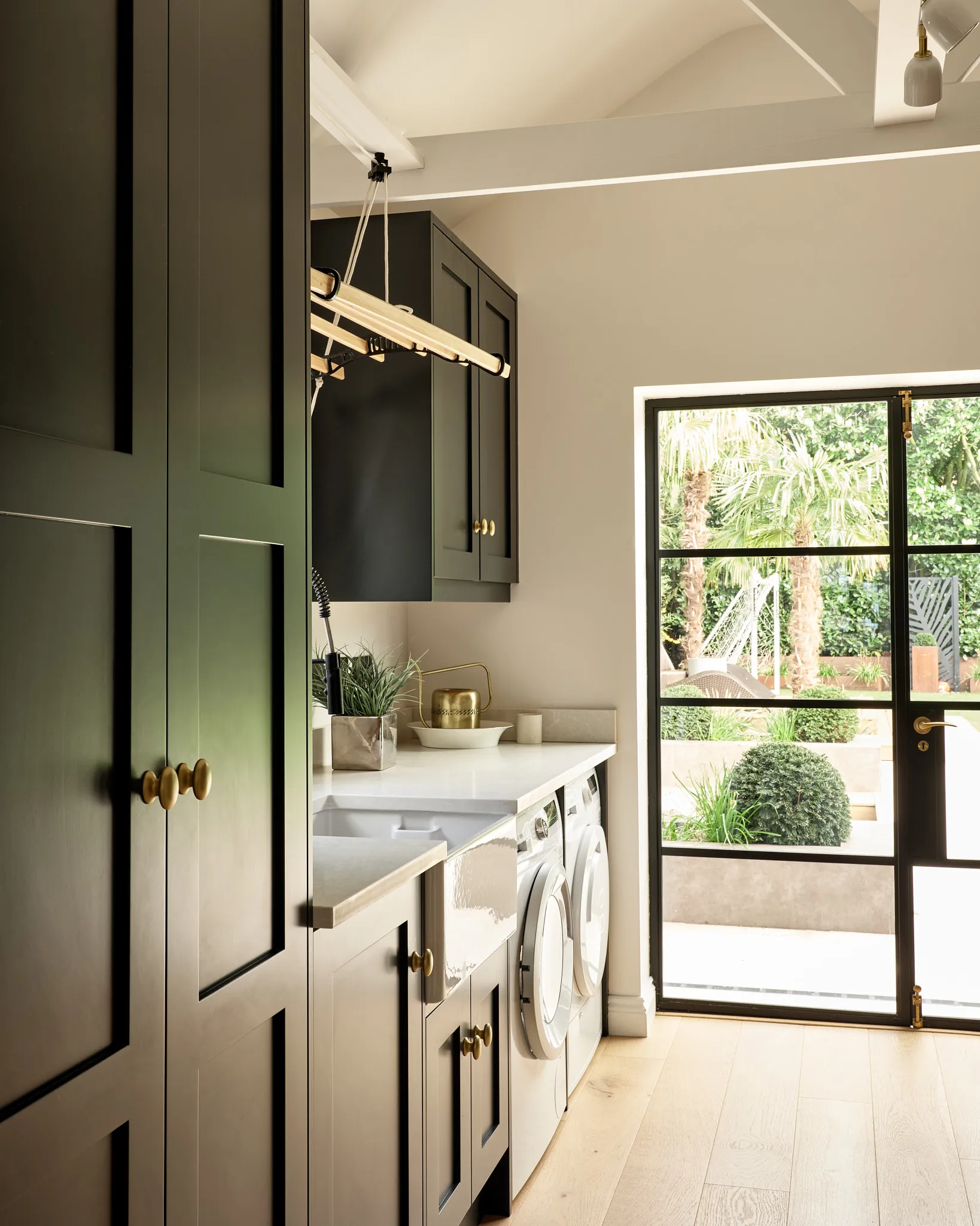 Dark green utility room