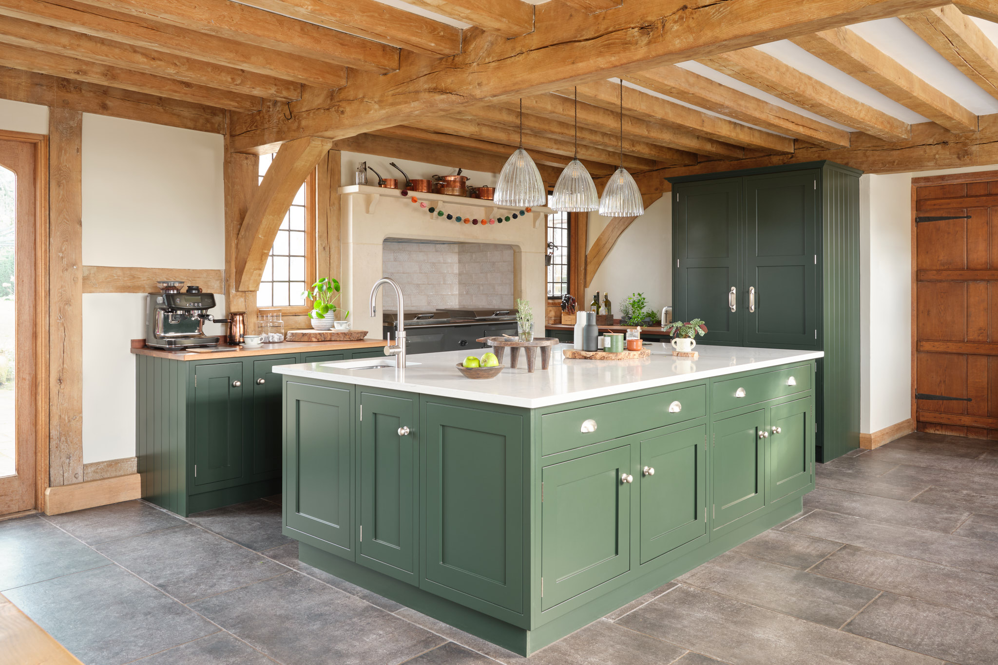 Traditional green country kitchen design with gorgeous soft light